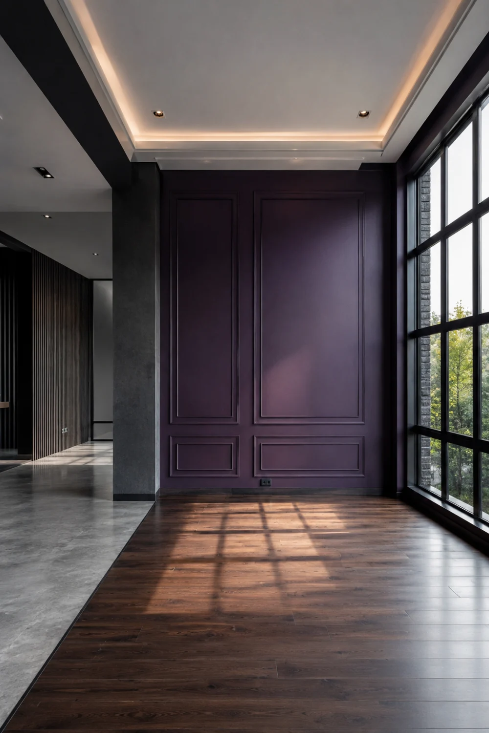 Modern living room with deep purple accent walls, charcoal architectural elements, black-framed windows, dark wood flooring, natural light, and contemporary luxury interior design inspiration.